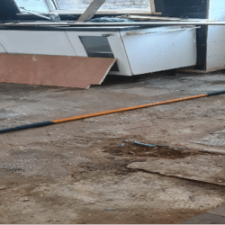 Kitchen (Before) - The kitchen units along with the walls and floor tiles were removed