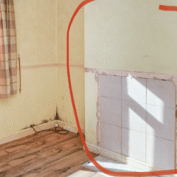Dining room (Before) - Old chimney in dining room area before removal