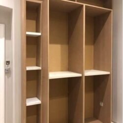 British Builders designed and constructed wall-mounted wardrobes which were sanded down and polished as a final step.