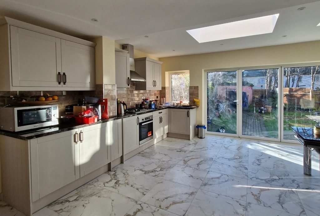 Extension & full renovation incl. kitchen, bathrooms, staircase. Delivered on time & budget, adding light & modern design.View full project